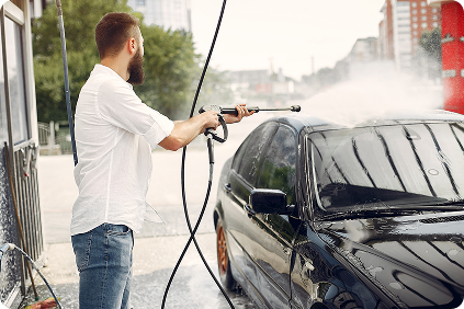 Cleaning car wheel with pressure washer